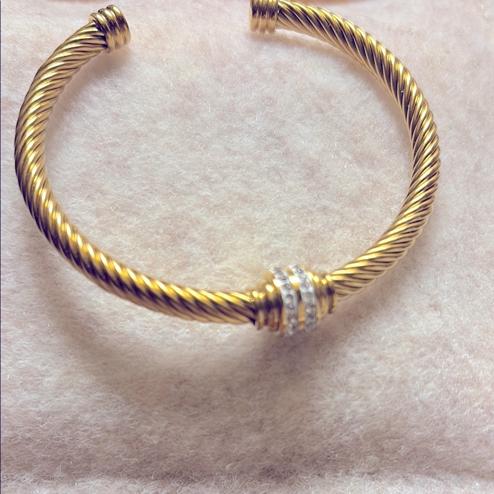 Elegant Gold and Silver Twisted Bracelet